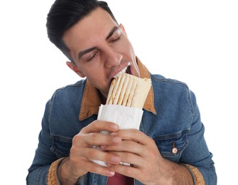 Photo of Man eating delicious shawarma on white background