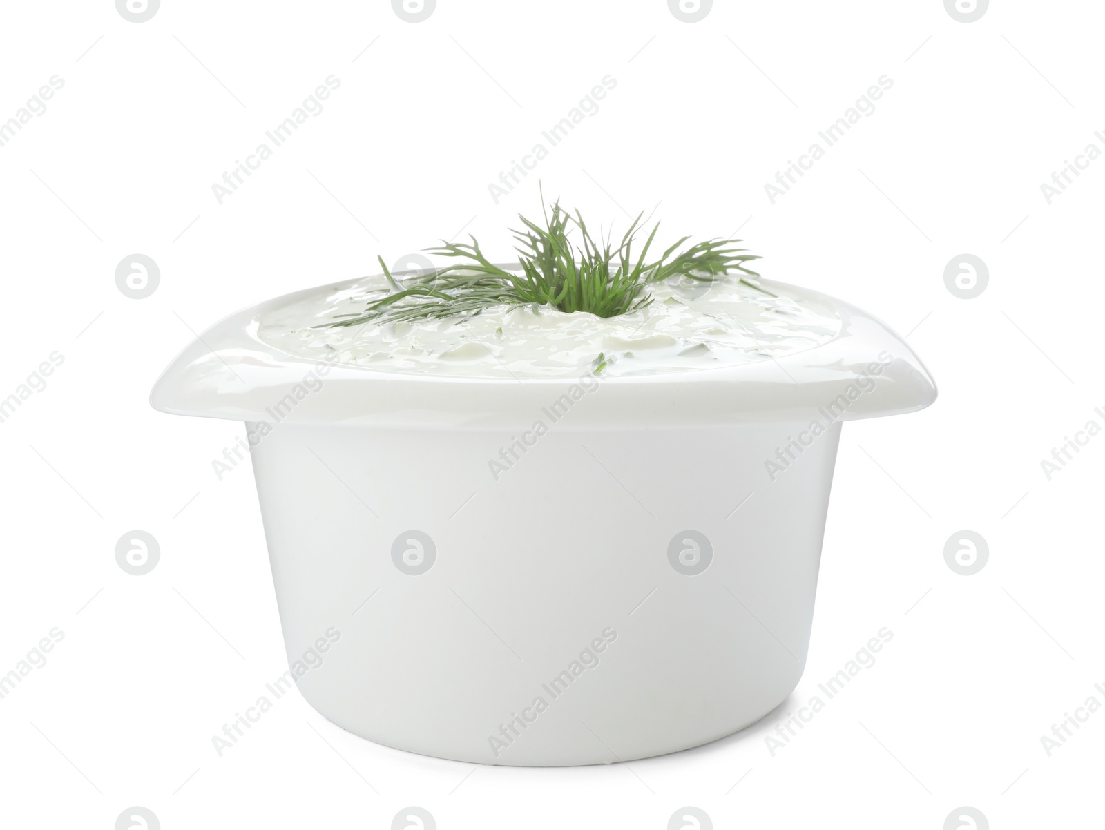 Photo of Bowl with cucumber sauce on white background