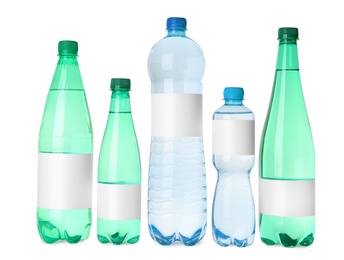 Bottles of pure water with blank labels on white background