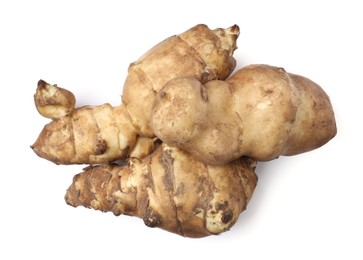 Jerusalem artichokes isolated on white, top view