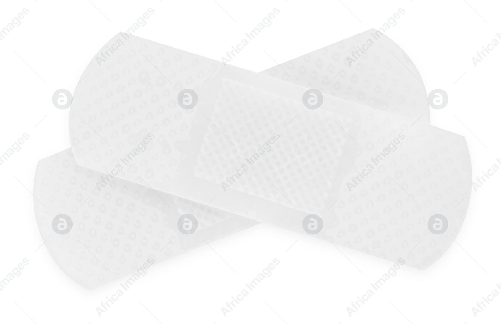 Photo of Medical adhesive bandages isolated on white, top view