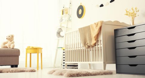 Image of Baby room interior with comfortable crib. Banner design