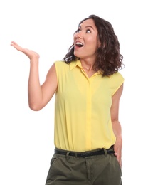 Photo of Surprised young woman standing on white background