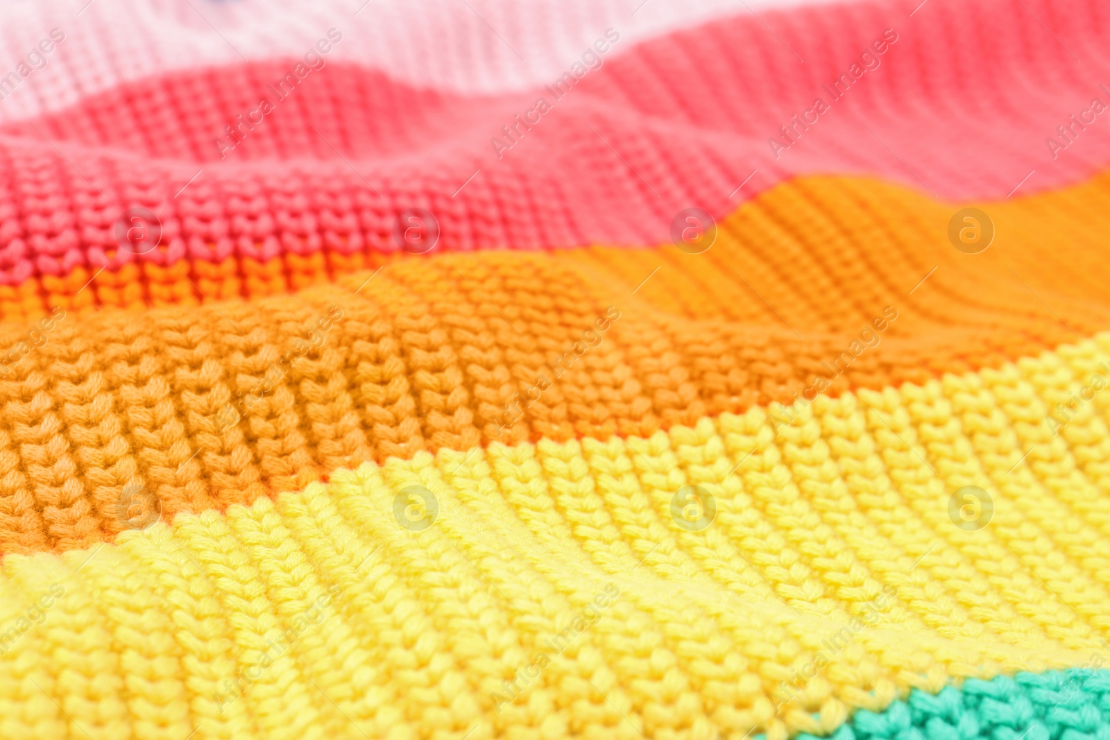 Photo of Texture of cozy warm sweater as background, closeup