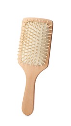 Bamboo hairbrush isolated on white. Conscious consumption