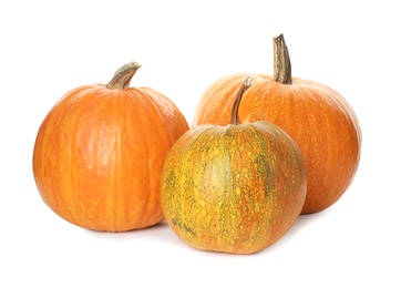 Photo of Fresh orange raw pumpkins isolated on white