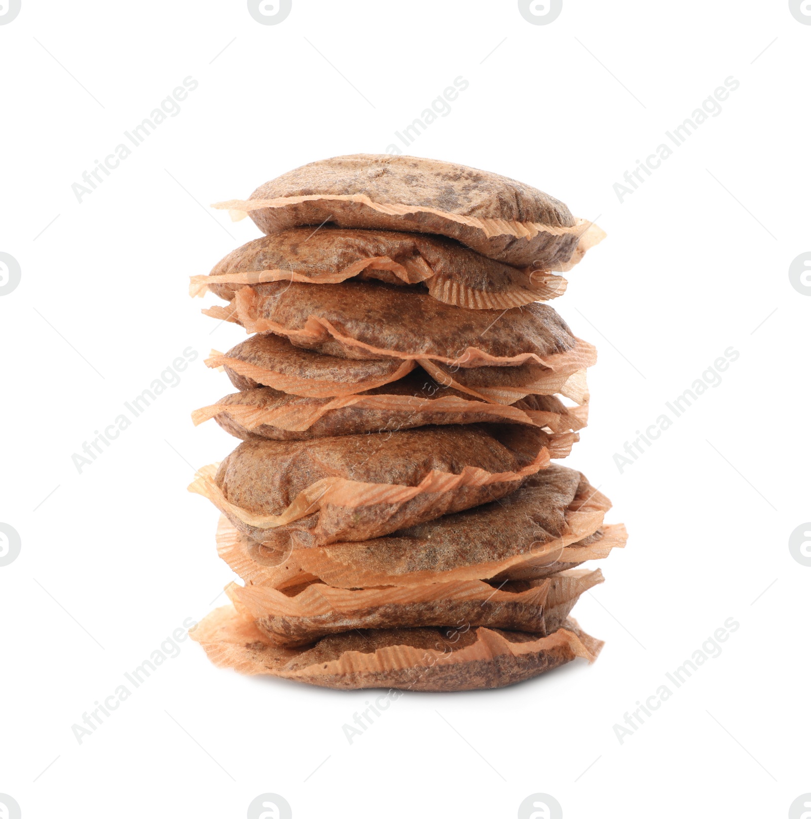 Photo of Many used tea bags on white background