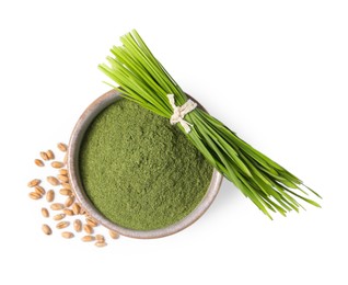 Photo of Wheat grass powder in bowl, seeds and fresh sprouts isolated on white, top view