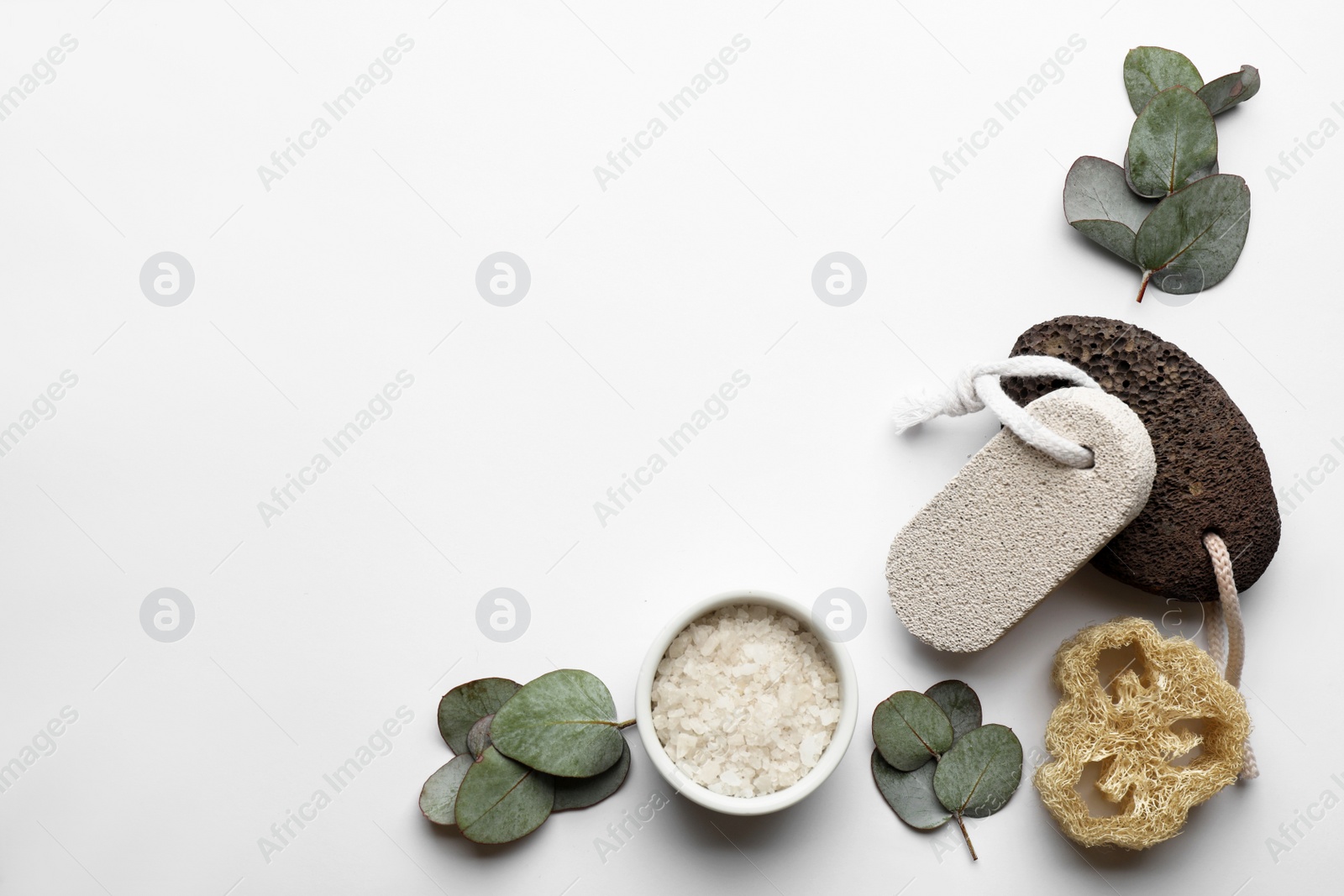 Photo of Flat lay composition with pumice stones on light background. Space for text