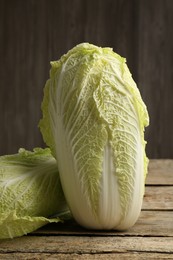 Fresh ripe Chinese cabbages on wooden table