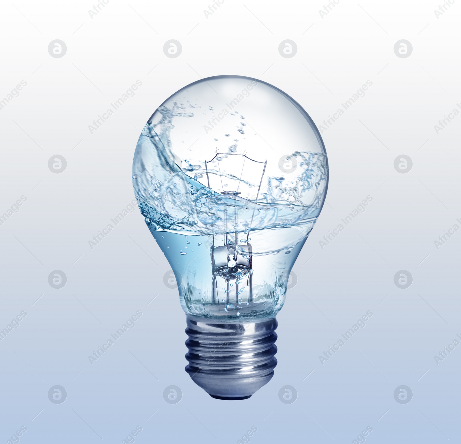 Image of Light bulb with water splashes on light background. Alternative energy source