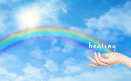 Image of Woman and rainbow as source of healing energy on sunny day, closeup