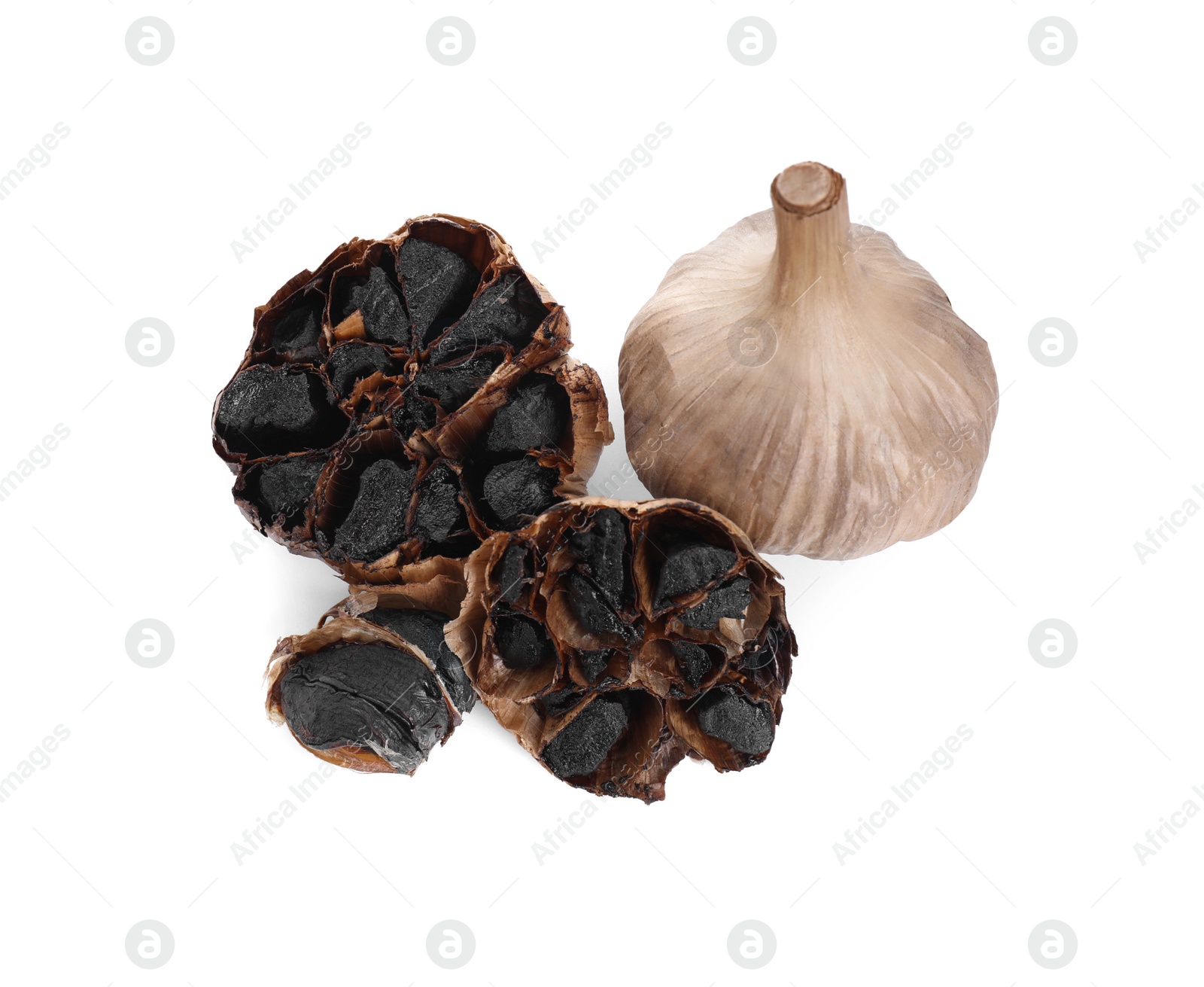 Photo of Organic fermented black garlic isolated on white, top view