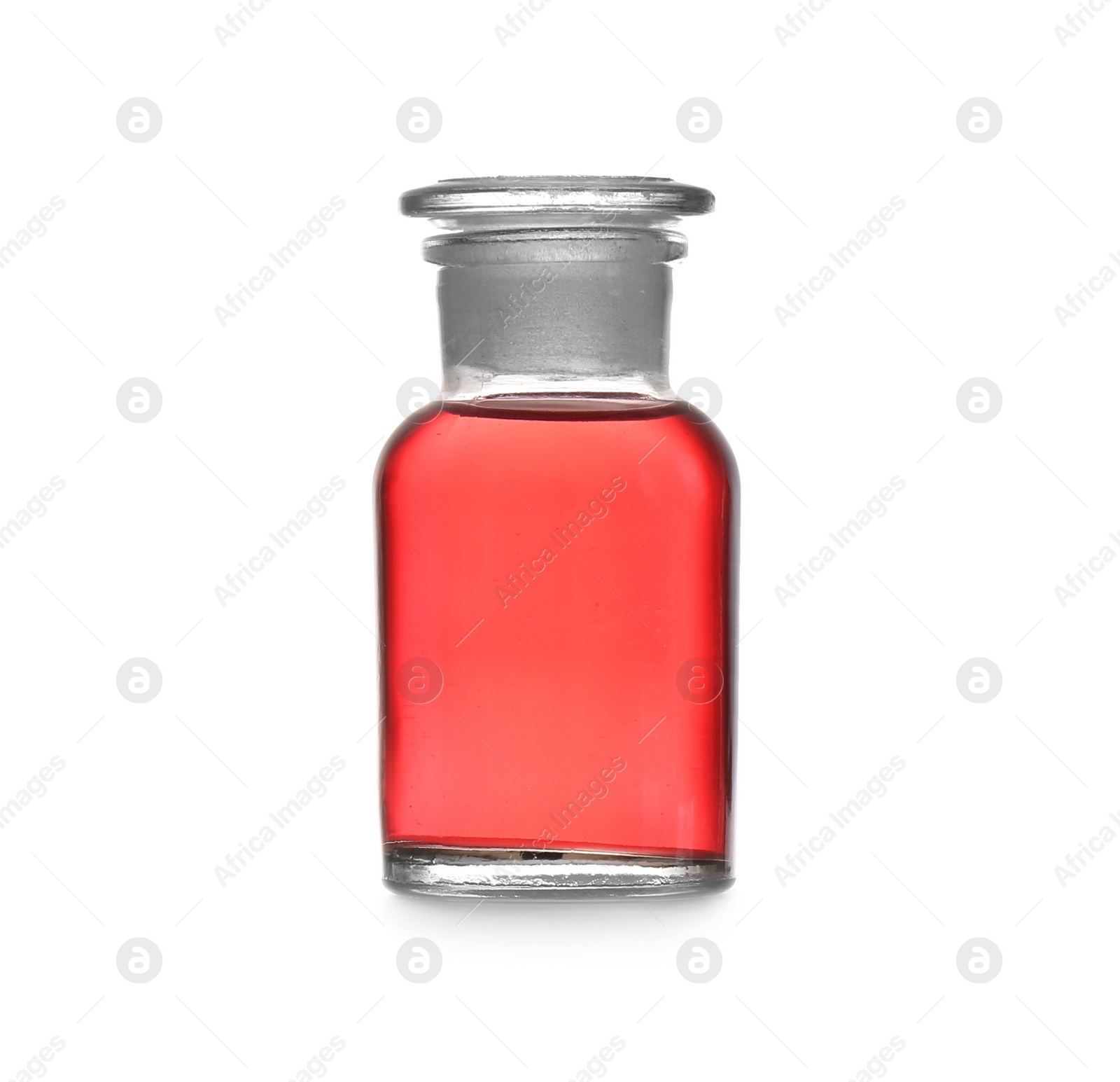 Photo of Glass bottle with color liquid isolated on white. Solution chemistry