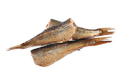 Photo of Tasty canned sprats isolated on white, top view