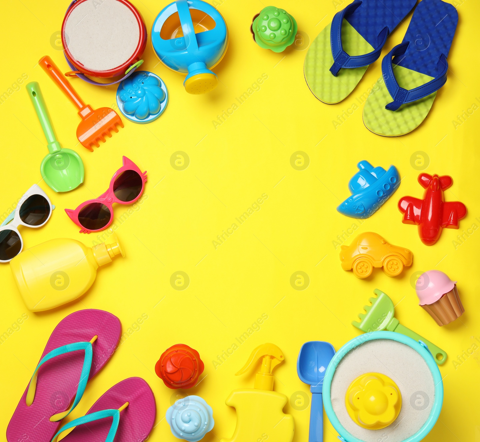 Photo of Flat lay composition with beach toys on color background. Space for text