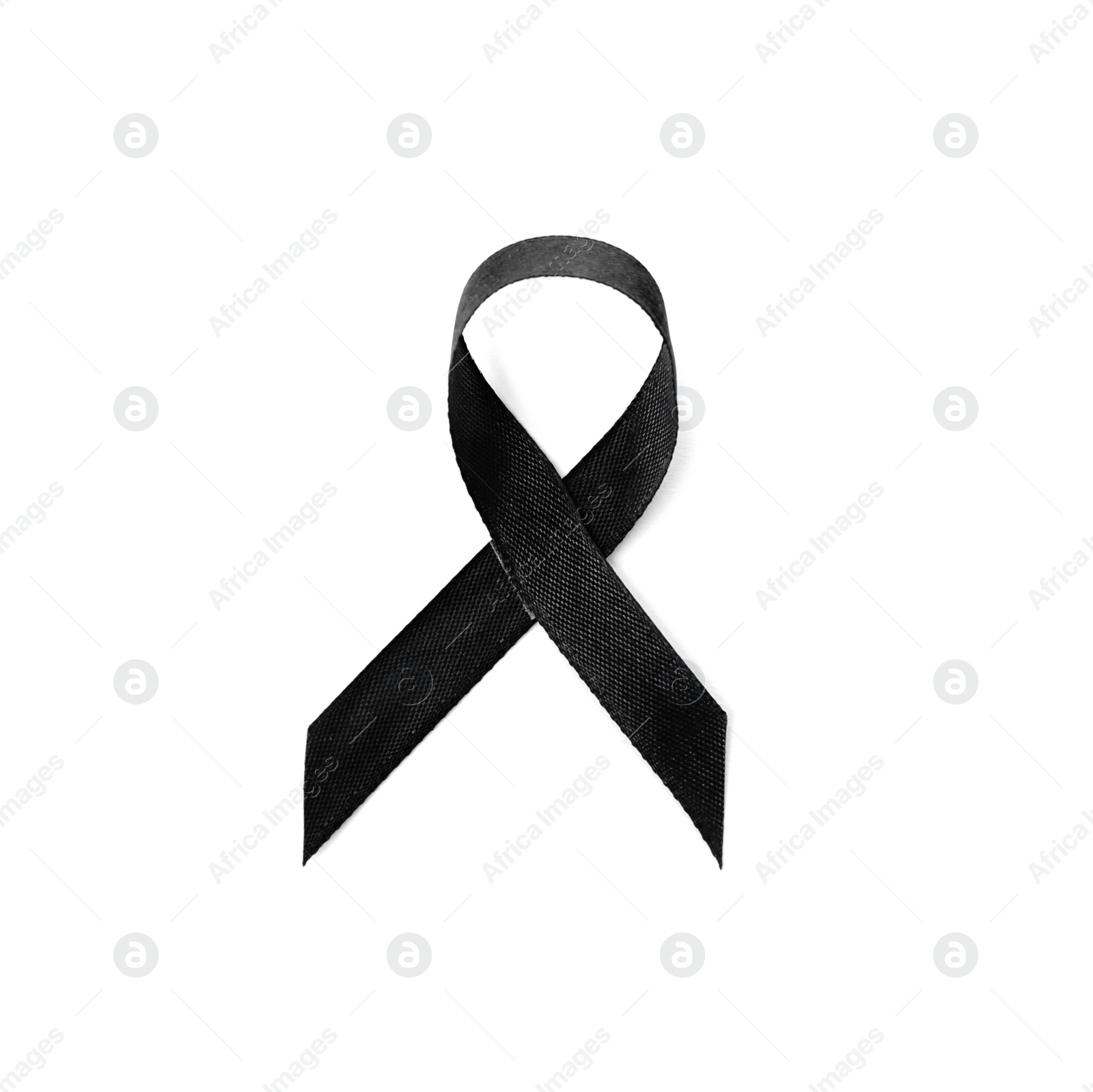 Photo of Black ribbon on white background. Funeral accessory