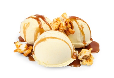 Photo of Delicious ice cream with caramel popcorn and sauce on white background