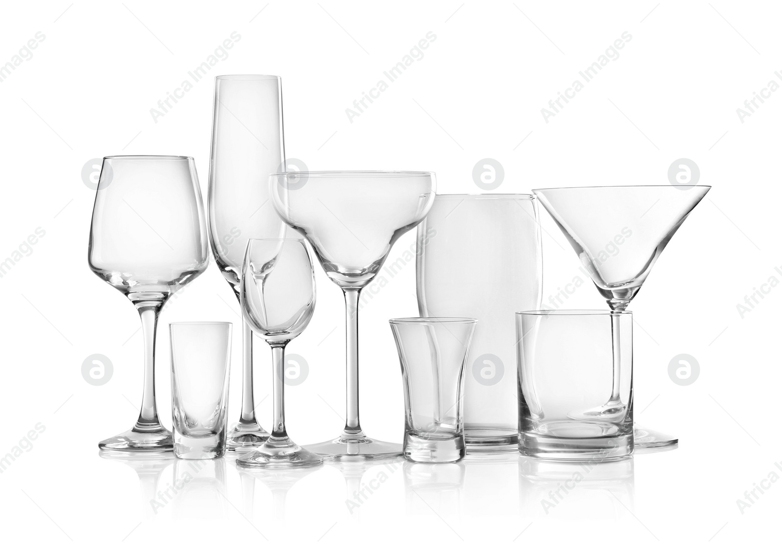 Photo of Set of new bar glassware on white background