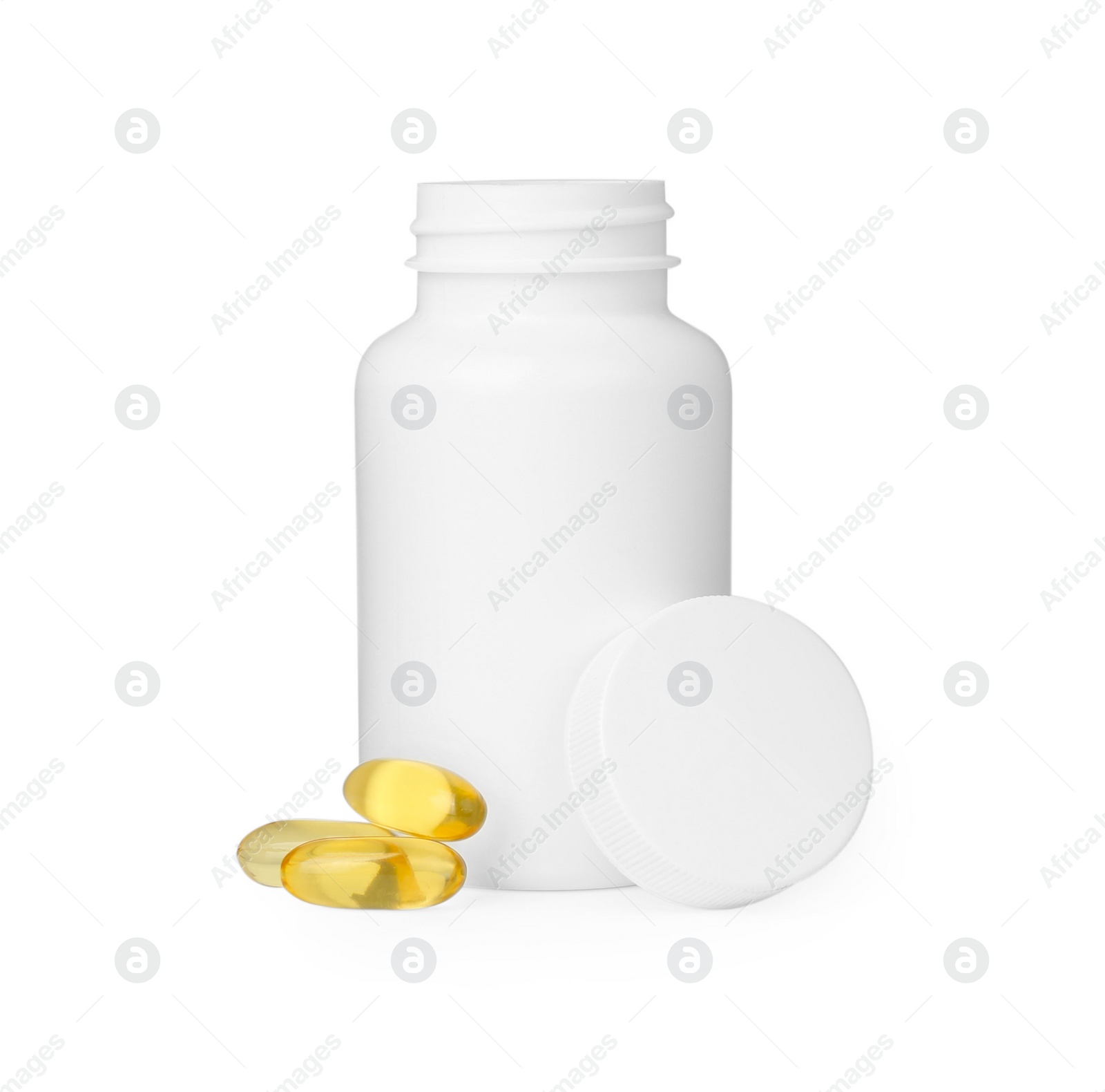 Photo of Blank jar and vitamin capsules isolated on white