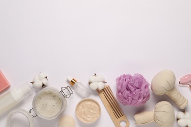 Bath accessories. Flat lay composition with personal care products on white background, space for text