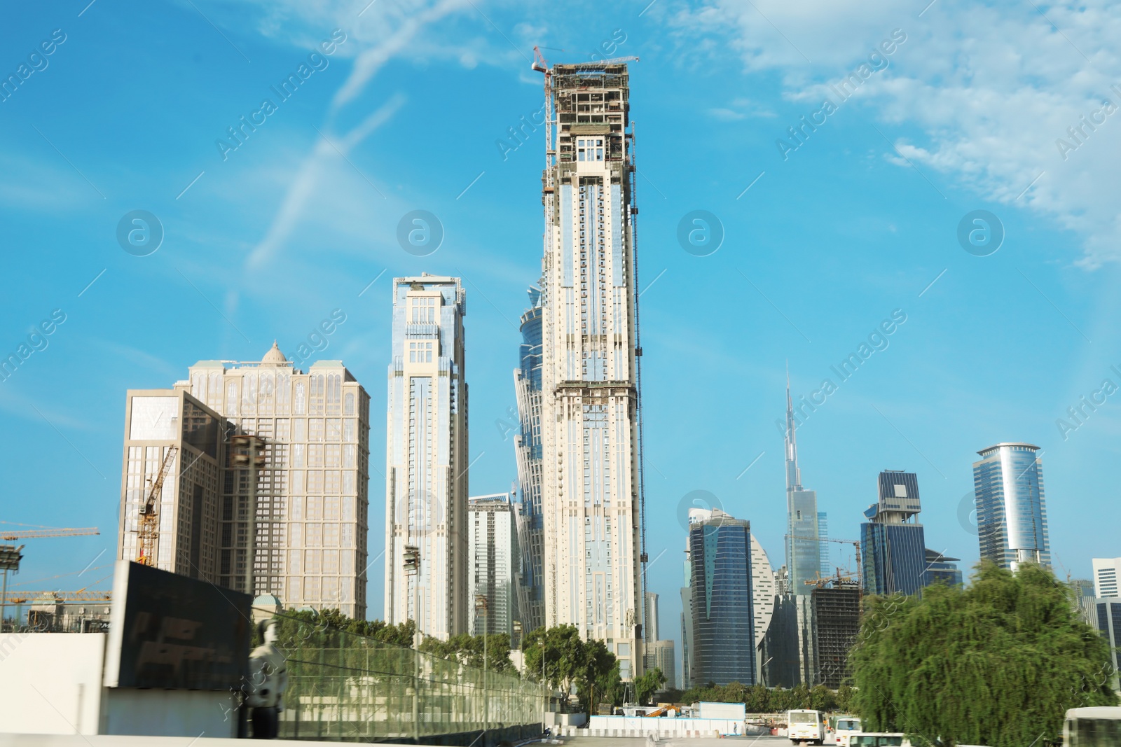 Photo of DUBAI, UNITED ARAB EMIRATES - NOVEMBER 03, 2018: Landscape with luxury hotels on sunny day