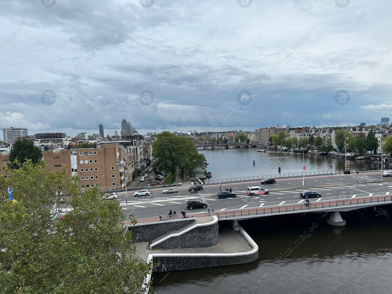 Photo of Amterdam, Netherlands - September 22, 2023: Beautiful view on city under cloudy sky