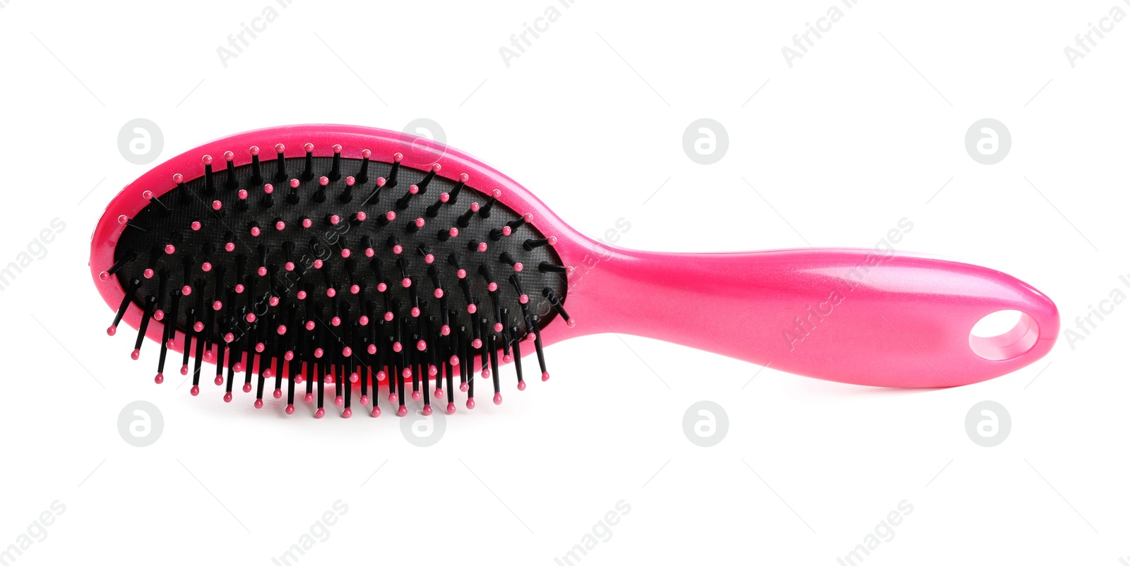 Photo of New modern hair brush on white background