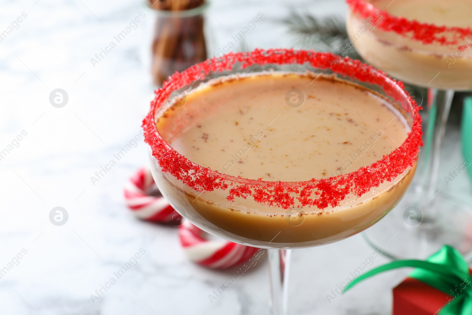 Photo of Delicious Christmas liqueur in glass, closeup view