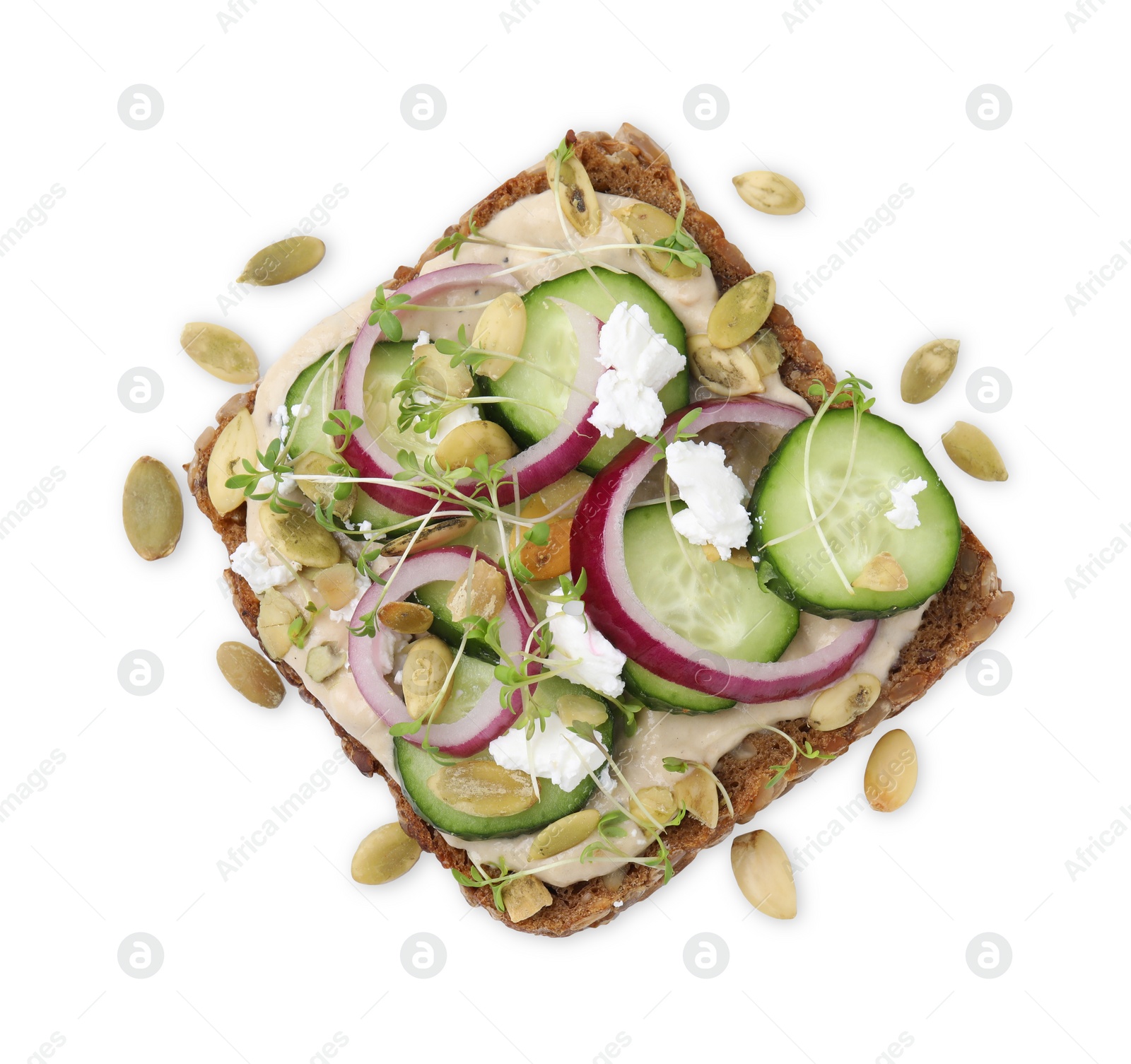 Photo of Tasty vegan sandwich with cucumber, onion, hummus and pumpkin seeds isolated on white, top view