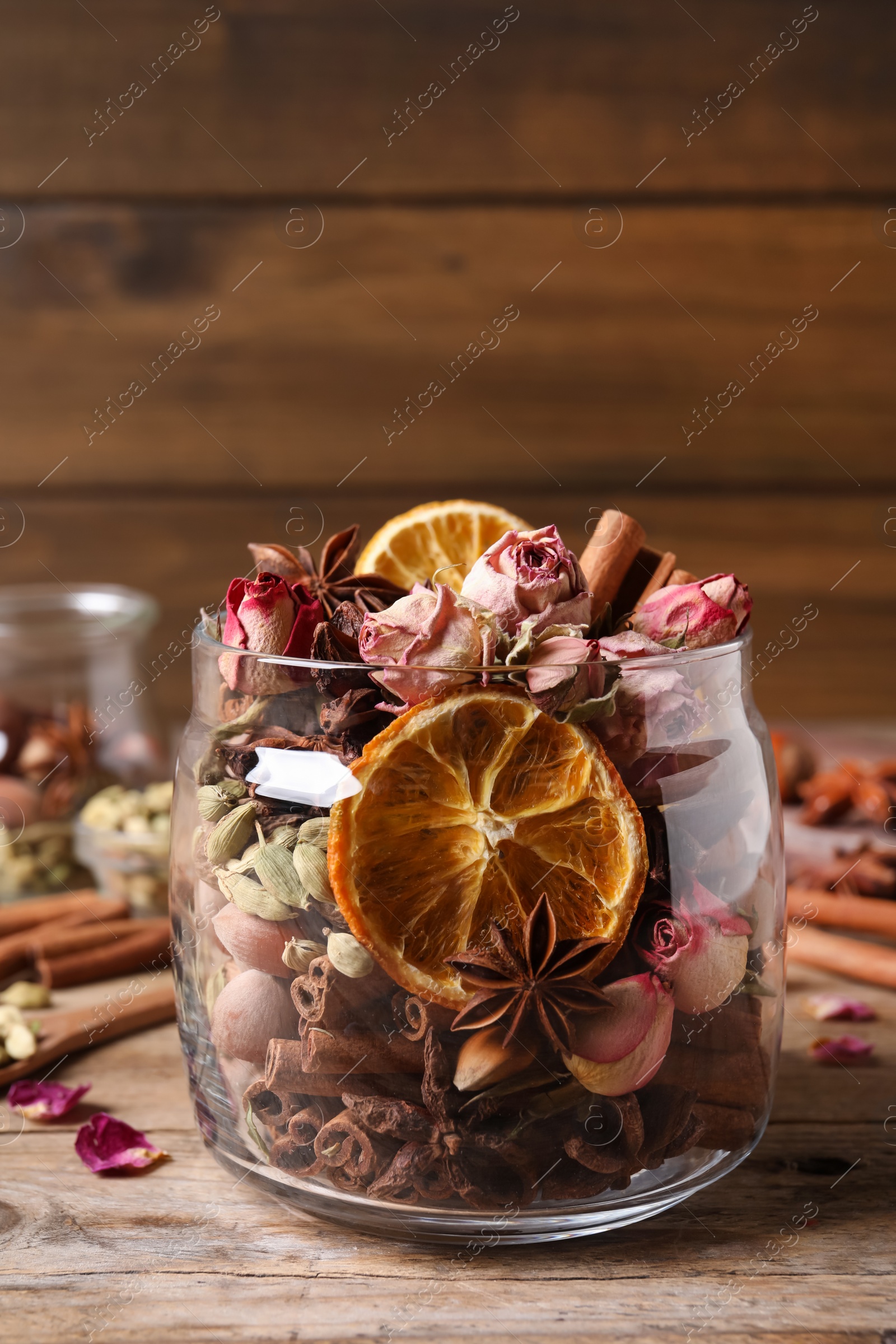 Photo of Aroma potpourri with different spices on wooden table