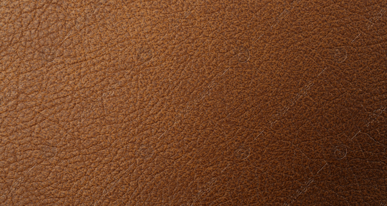 Photo of Brown natural leather as background, top view