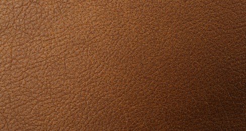 Brown natural leather as background, top view