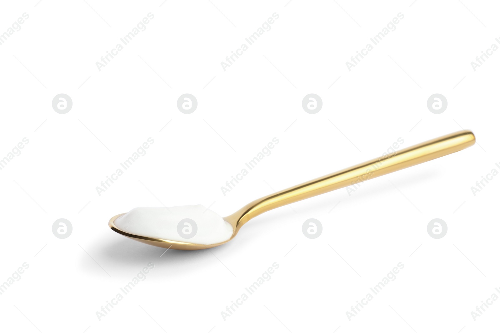 Photo of Spoon with tasty organic yogurt isolated on white