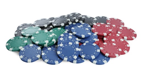 Photo of Plastic chips on white background. Poker game