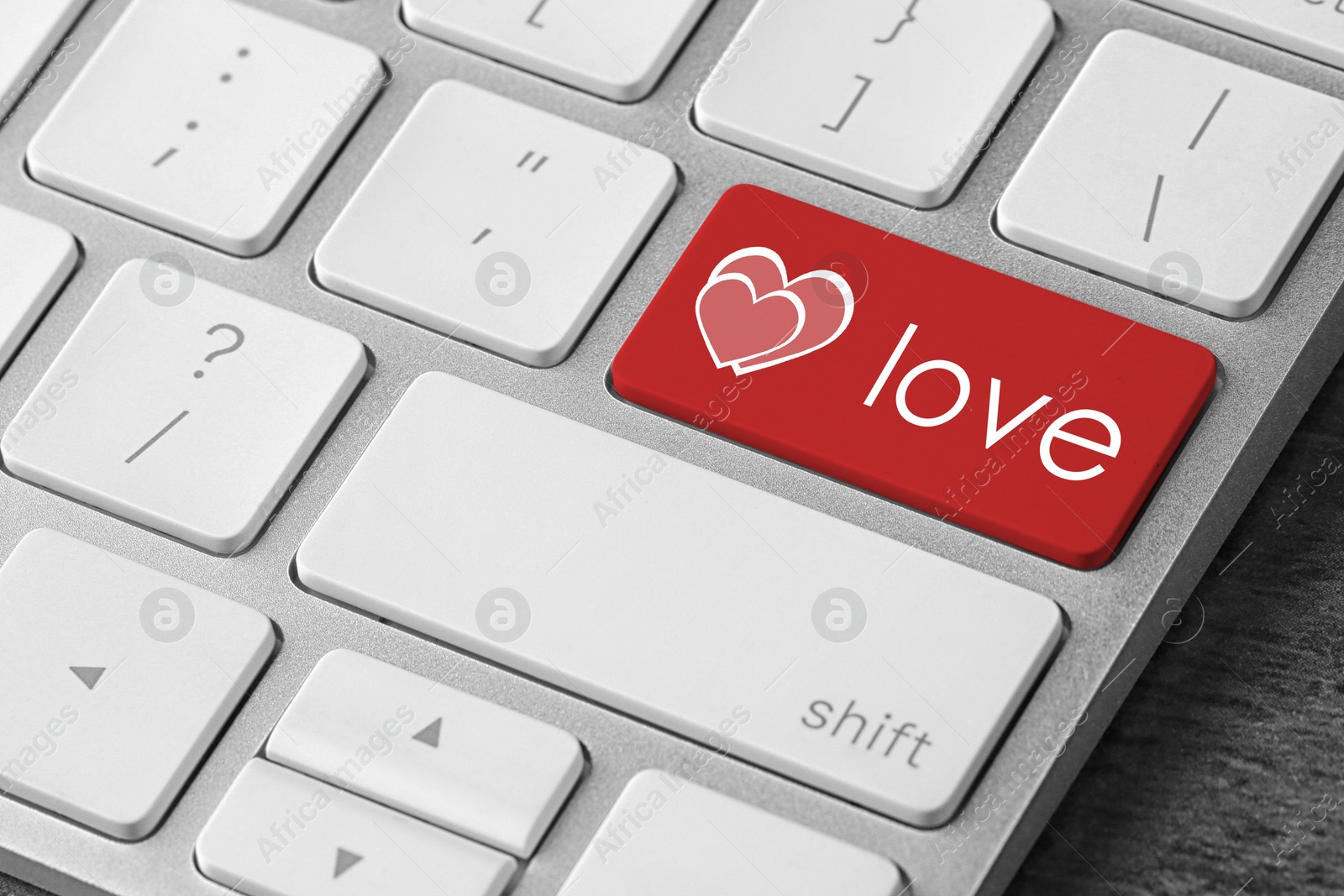 Image of Love button on laptop keyboard, closeup. Online dating site