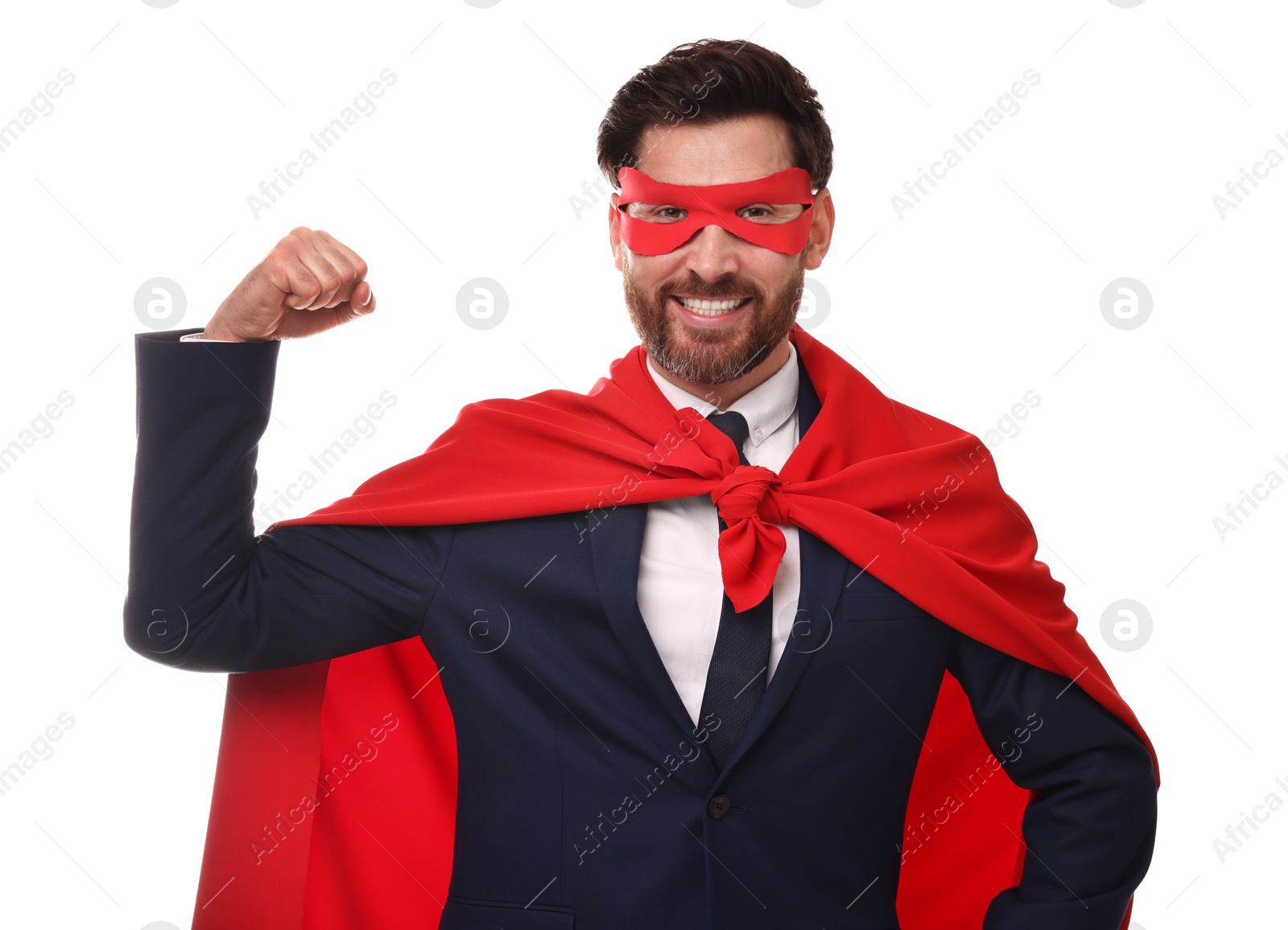 Photo of Happy businessman wearing red superhero cape and mask on white background