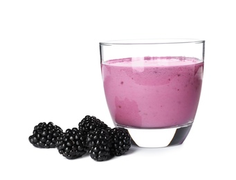 Glass with blackberry yogurt smoothie on white background