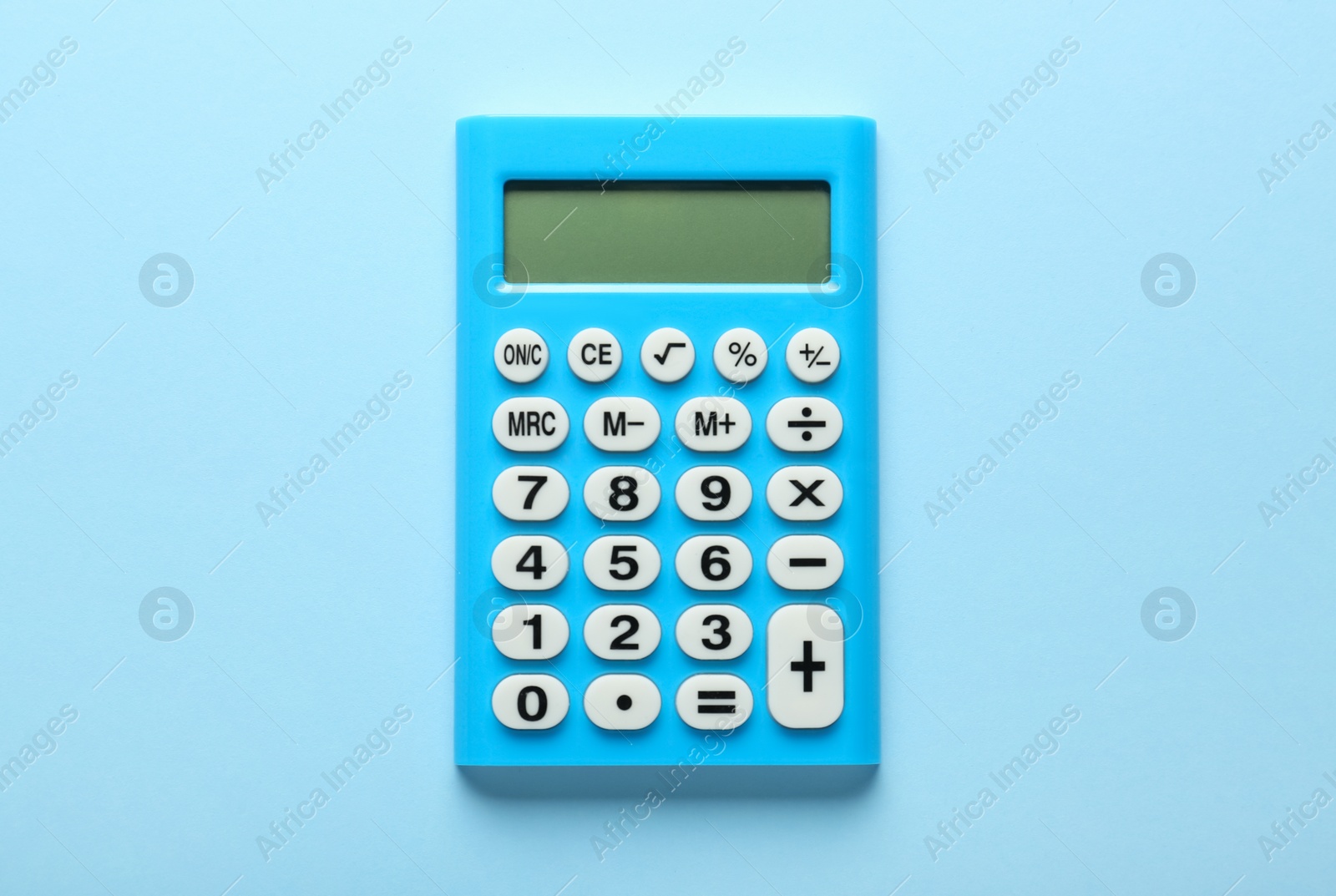 Photo of Light blue calculator on turquoise background, top view