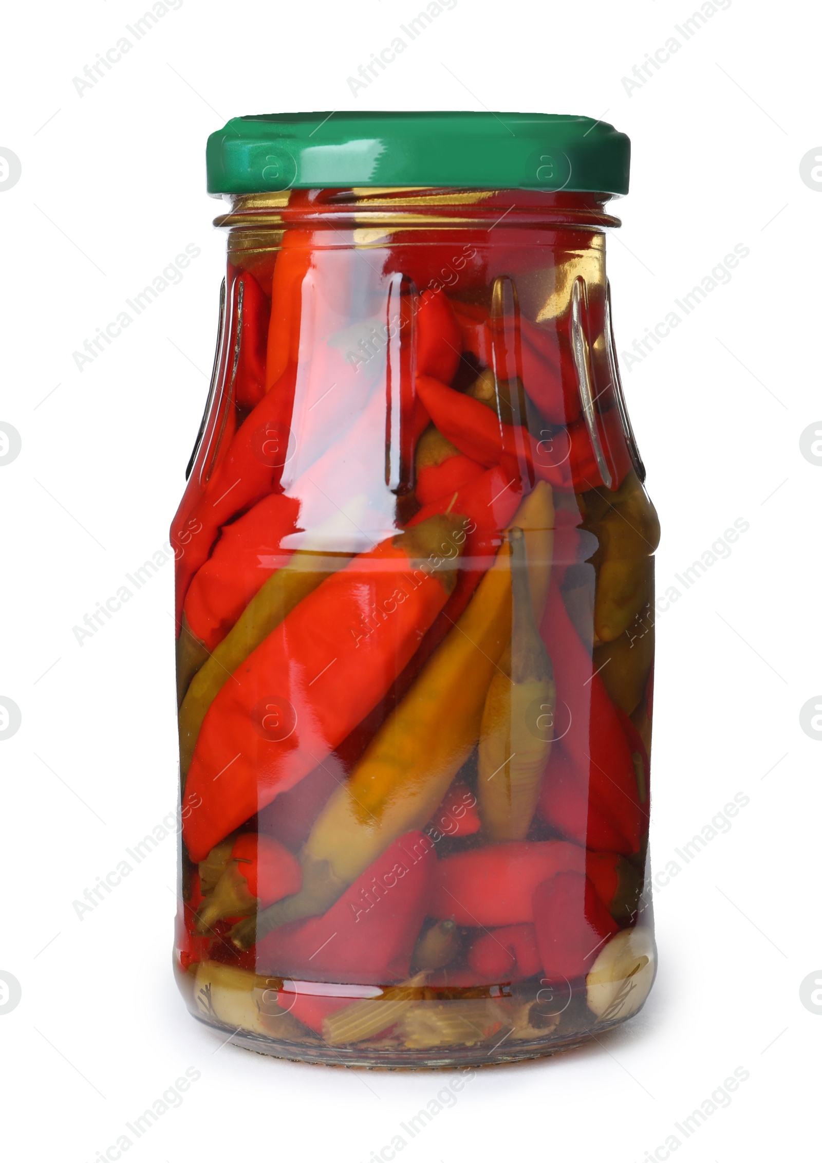 Photo of Glass jar with pickled chili peppers isolated on white