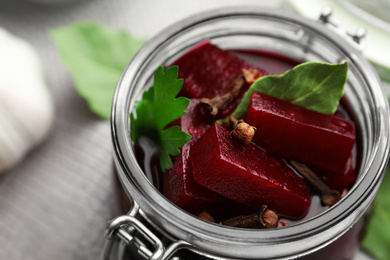 Delicious pickled beets in jar, closeup view