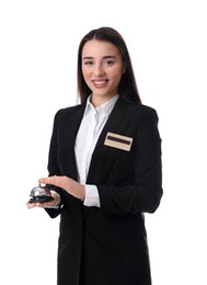 Photo of Happy young receptionist in uniform holding service bell on white background