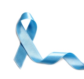 Photo of Blue ribbon on white background, top view. Cancer awareness