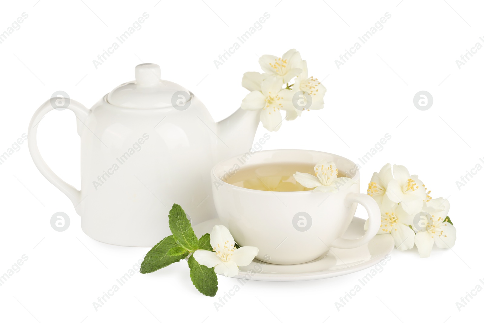Photo of Aromatic herbal tea with mint and jasmine flowers isolated on white
