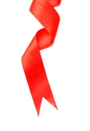 Photo of Simple red ribbon on white background, top view