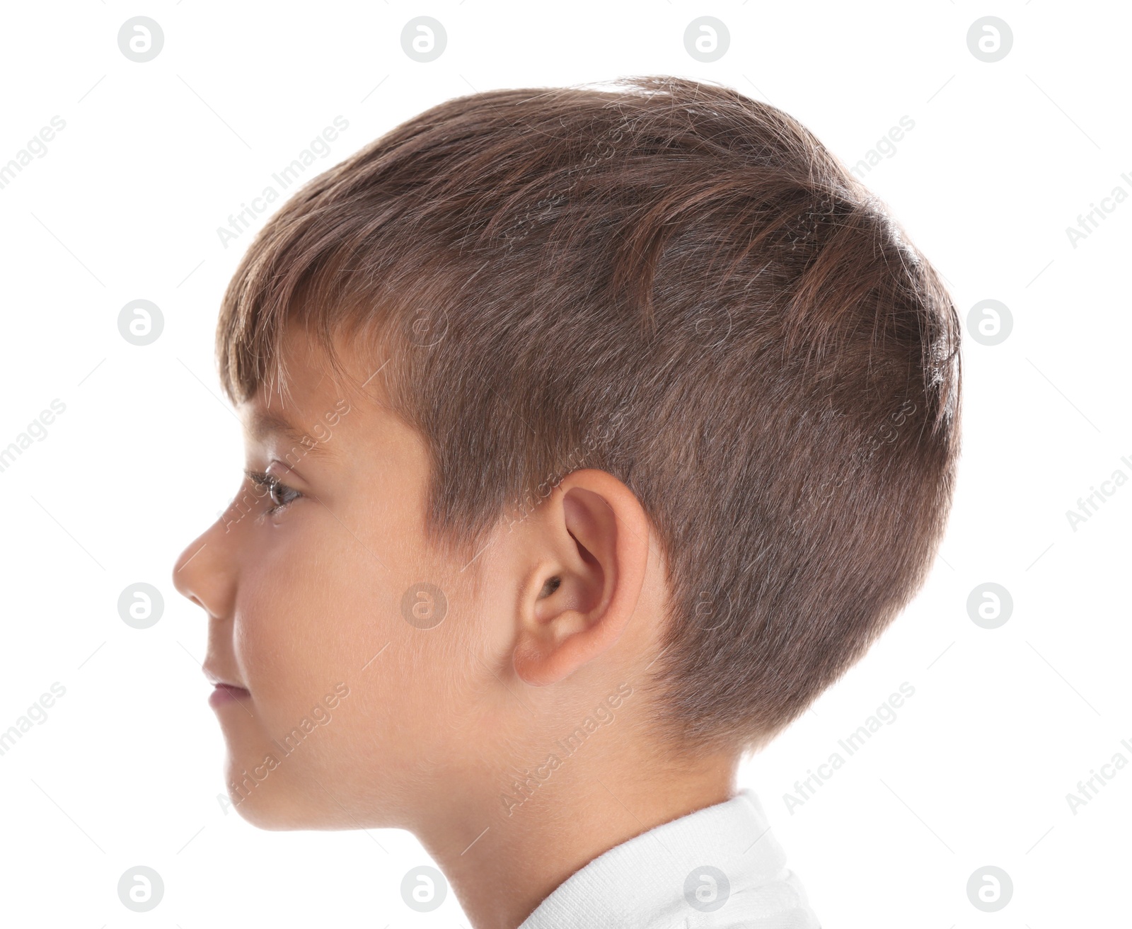 Photo of Cute little boy on white background, closeup. Hearing problem