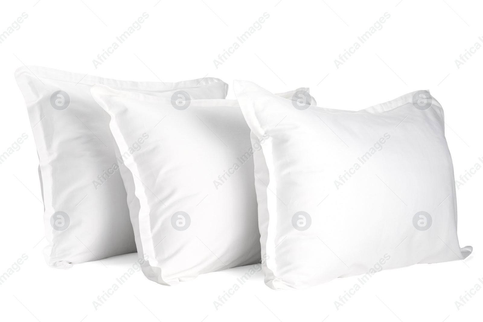 Photo of Many new soft pillows isolated on white