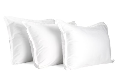 Photo of Many new soft pillows isolated on white