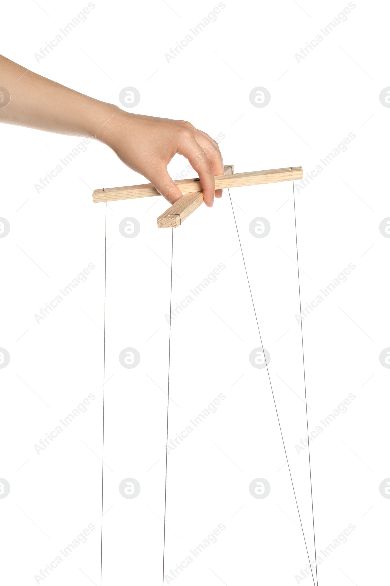 Photo of Woman pulling strings of puppet on white background, closeup