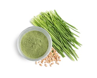 Wheat grass powder in glass, seeds and fresh sprouts isolated on white, top view